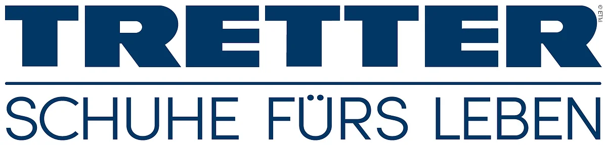Schriftzug Tretter Schuhe fürs Leben in Großbuchstaben